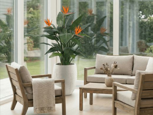 Designplants/Luca Lifestyle Strelitzia Kunstpflanze (h:145 cm) mit Grigio Tall Balloon Blumentopf - Orange (Blumentopf = Antique White)